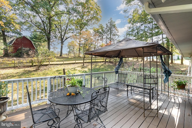 wooden deck featuring a gazebo