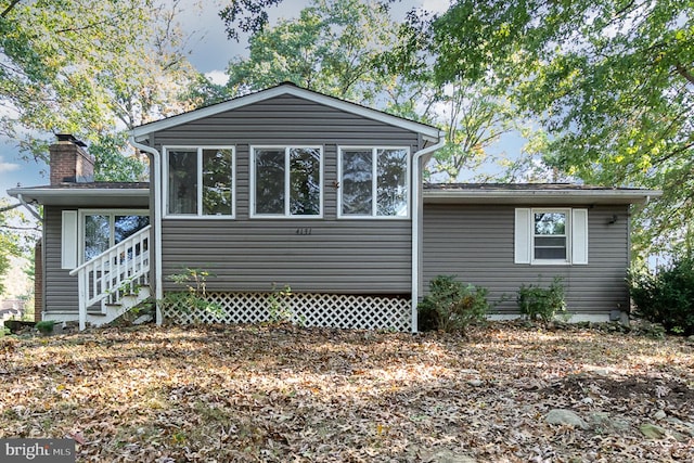 exterior space with a sunroom