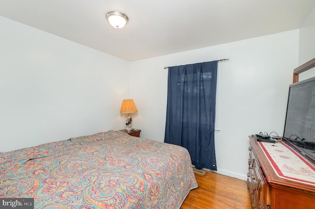 bedroom featuring light hardwood / wood-style floors