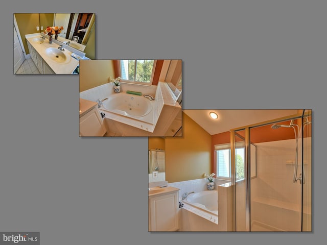 bathroom with vanity, shower with separate bathtub, and vaulted ceiling