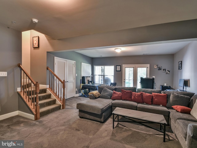 living room with carpet floors and french doors