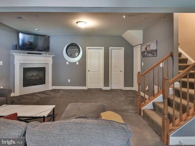 living room featuring dark carpet