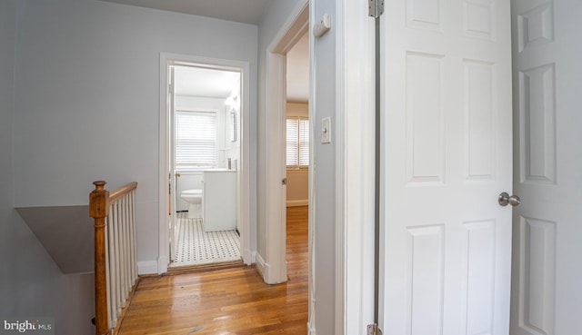 hallway featuring light wood-type flooring