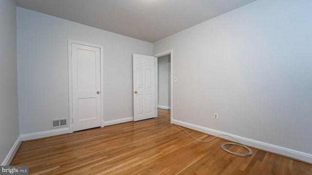 unfurnished bedroom featuring light hardwood / wood-style flooring