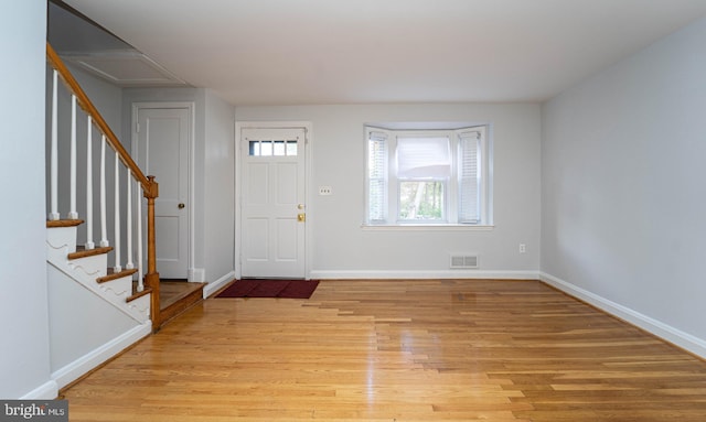 entrance foyer with light hardwood / wood-style flooring