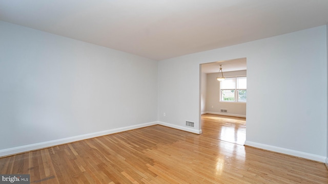 empty room featuring light hardwood / wood-style floors