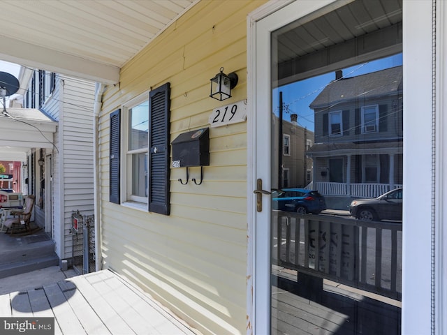 wooden deck featuring covered porch
