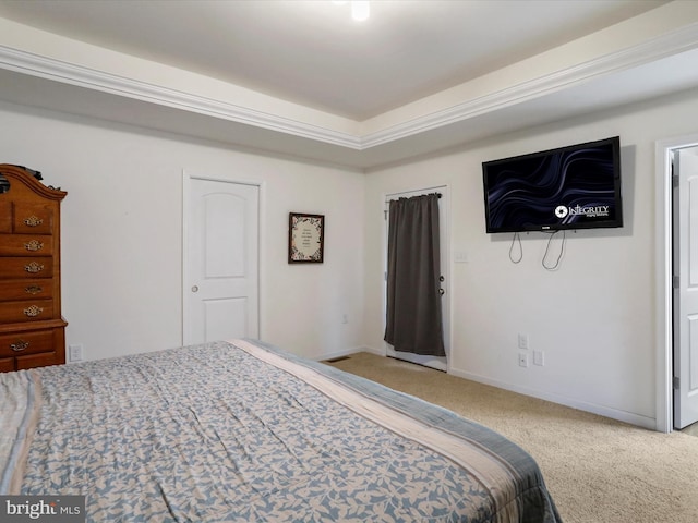 bedroom featuring carpet flooring and baseboards