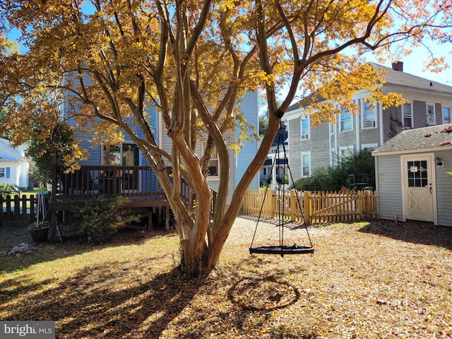 view of yard featuring a shed and a deck