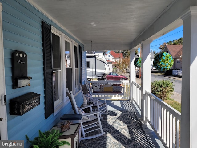 exterior space featuring covered porch