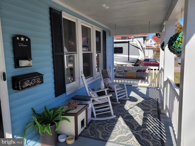 view of patio featuring a porch