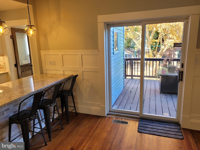 entryway featuring dark wood-type flooring