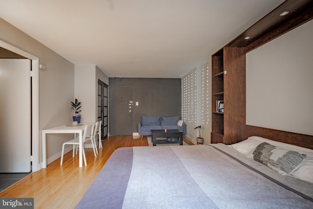 bedroom featuring hardwood / wood-style floors