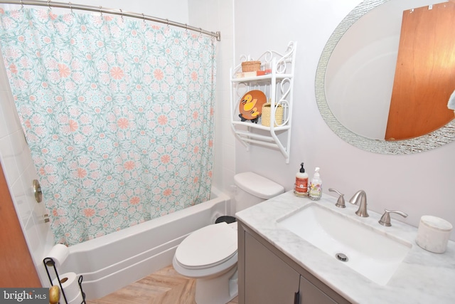 full bathroom with toilet, shower / tub combo with curtain, and vanity