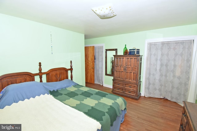 bedroom featuring hardwood / wood-style floors