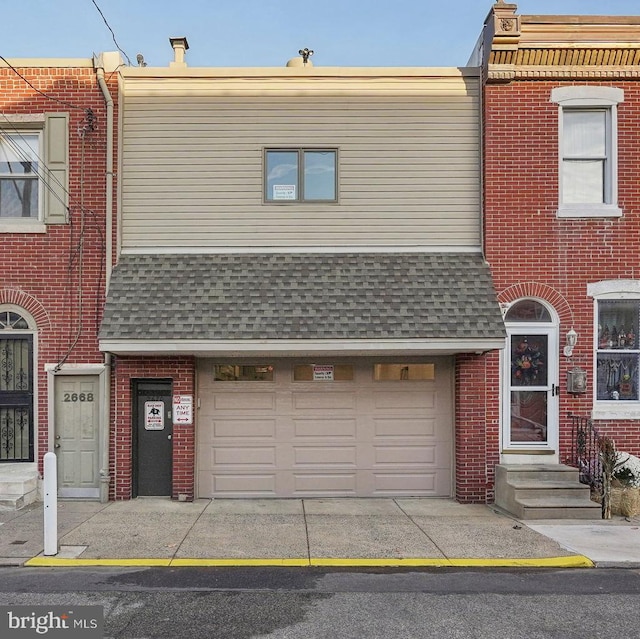 view of property featuring a garage