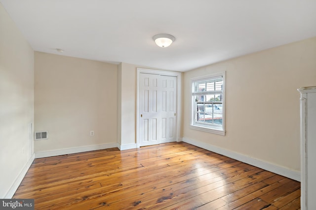 unfurnished bedroom featuring light hardwood / wood-style floors