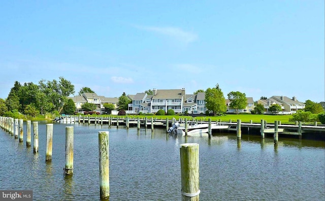 property view of water featuring a dock