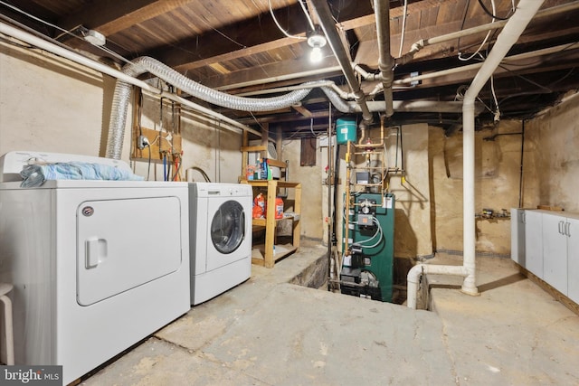 basement featuring washing machine and dryer