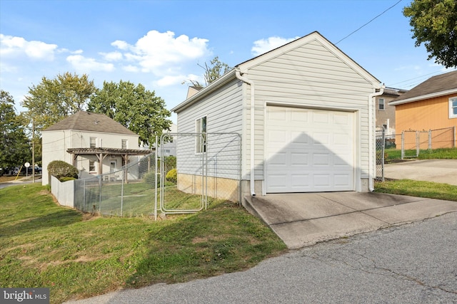 garage featuring a yard