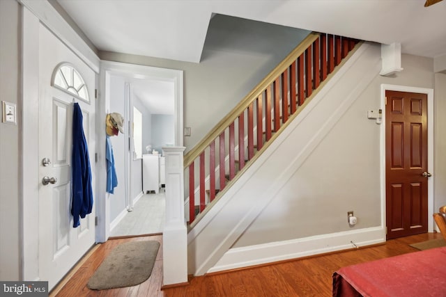 entrance foyer featuring hardwood / wood-style flooring