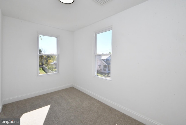 view of carpeted spare room