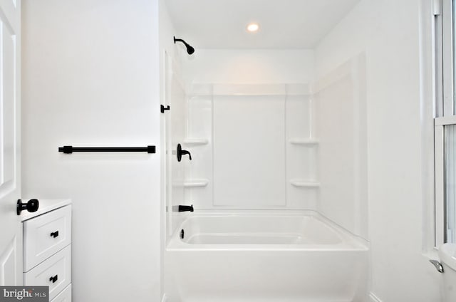 bathroom with toilet and shower / washtub combination