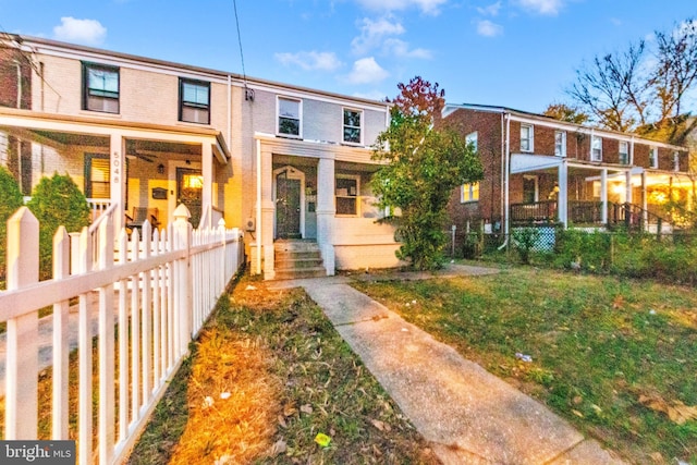 view of property with a porch