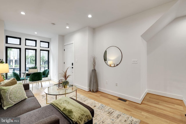 living room featuring light wood-type flooring