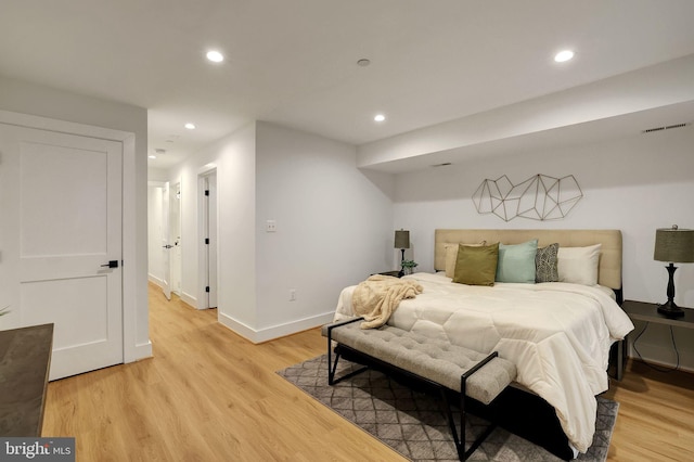 bedroom with light wood-type flooring