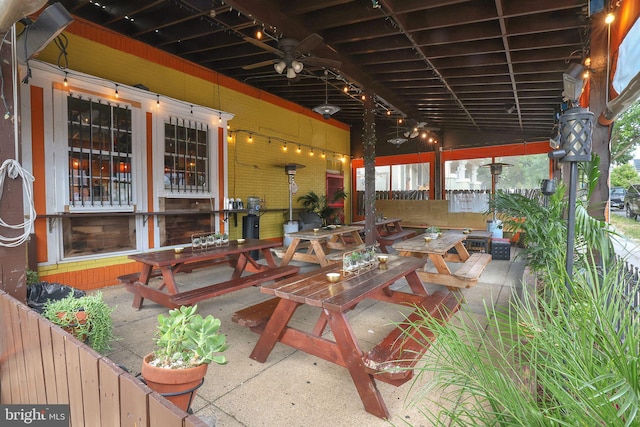 view of patio / terrace featuring ceiling fan