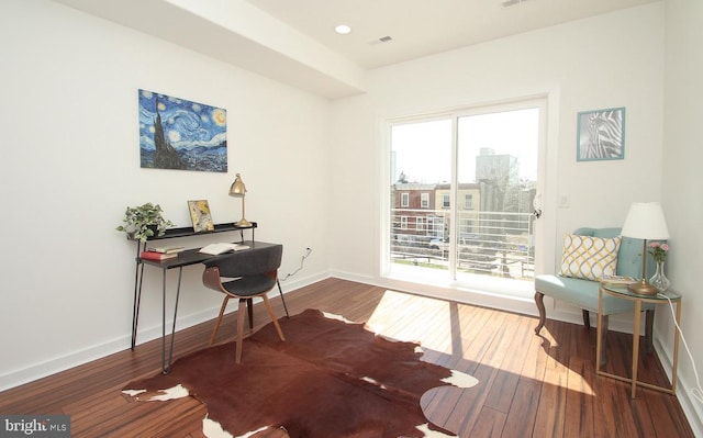 office with hardwood / wood-style flooring