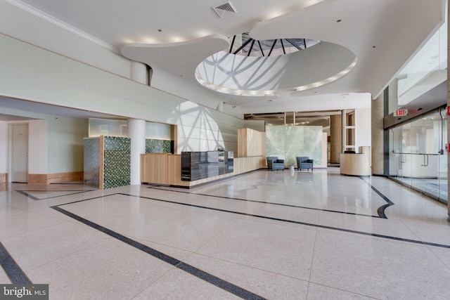 building lobby featuring visible vents