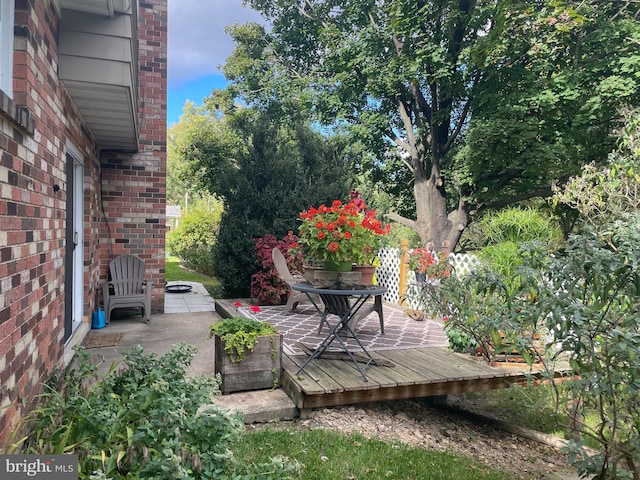 view of patio / terrace featuring a wooden deck