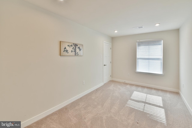 view of carpeted spare room