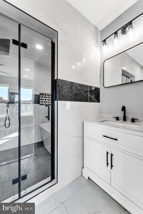 bathroom featuring vanity and plus walk in shower