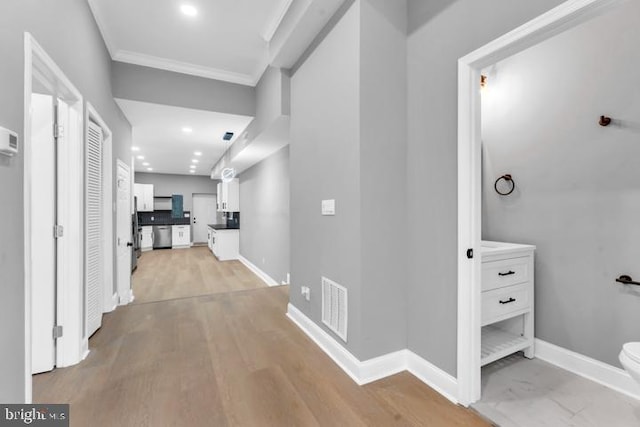 hall featuring light hardwood / wood-style floors