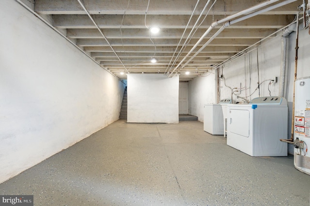 basement with washing machine and dryer and gas water heater