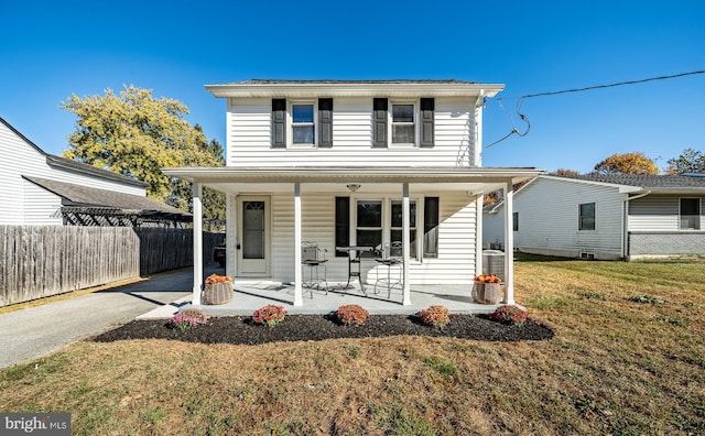 325 Howell School Rd, Bear, DE 19701 - view of front of property featuring a front lawn, a porch, and fence