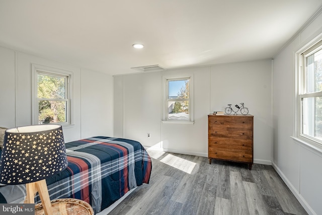 325 Howell School Rd, Bear, DE 19701 - bedroom with recessed lighting, multiple windows, and wood finished floors