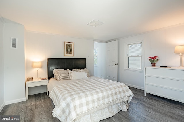 325 Howell School Rd, Bear, DE 19701 - bedroom featuring crown molding, baseboards, visible vents, and dark wood finished floors
