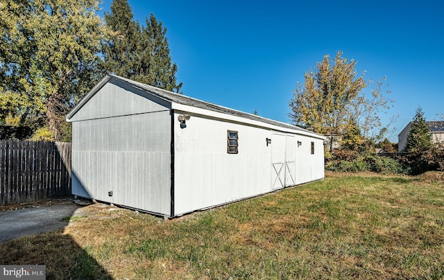 325 Howell School Rd, Bear, DE 19701 - view of property exterior with a yard, fence, and an outbuilding