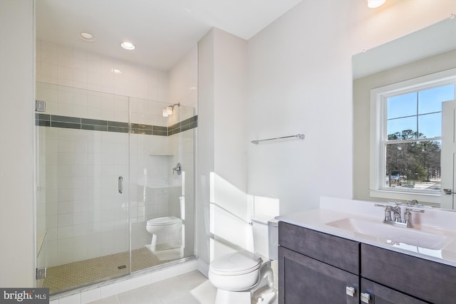 full bath featuring recessed lighting, toilet, a stall shower, vanity, and tile patterned flooring