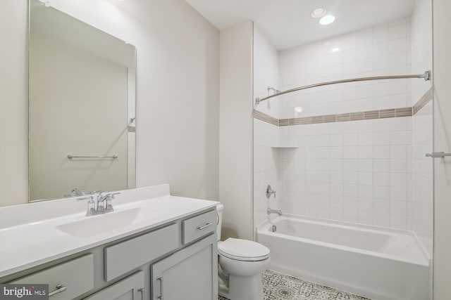 bathroom featuring toilet, recessed lighting, bathtub / shower combination, and vanity