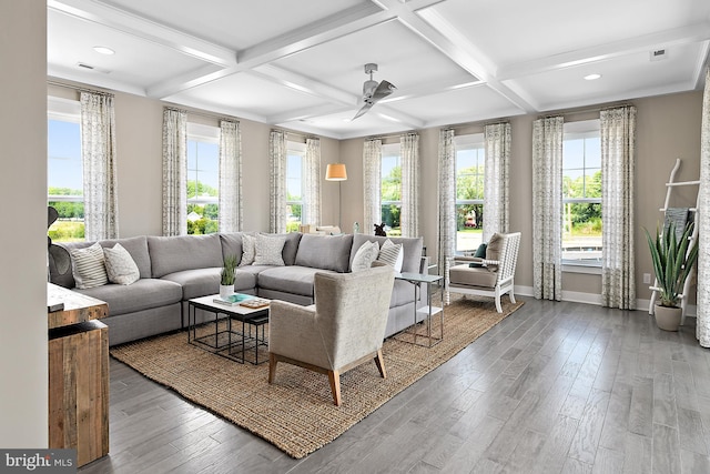 living room with beamed ceiling, coffered ceiling, and hardwood / wood-style flooring