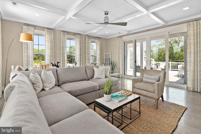 living room featuring ceiling fan, ornamental molding, beam ceiling, coffered ceiling, and hardwood / wood-style floors