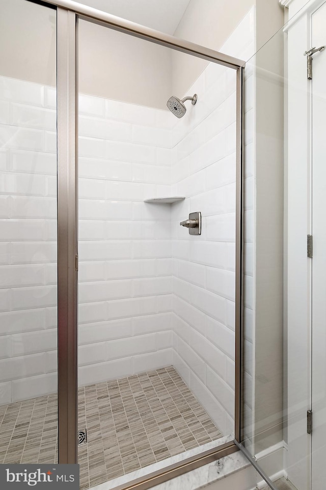 bathroom with an enclosed shower