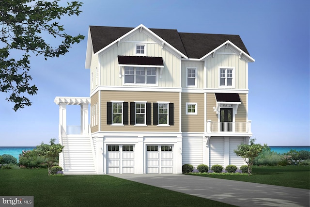 view of front facade featuring a water view, a garage, and a front yard