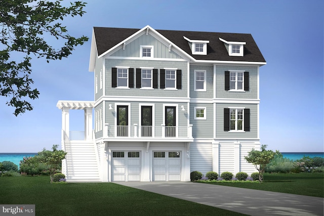 view of front of house featuring a water view, a garage, and a front lawn