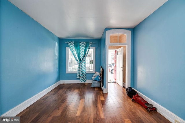 spare room featuring hardwood / wood-style floors